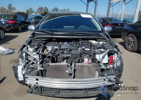 2021 Toyota Corolla Hybrid Le z USA, uszkodzony, nr VIN JTDEAMDE9MJ013362